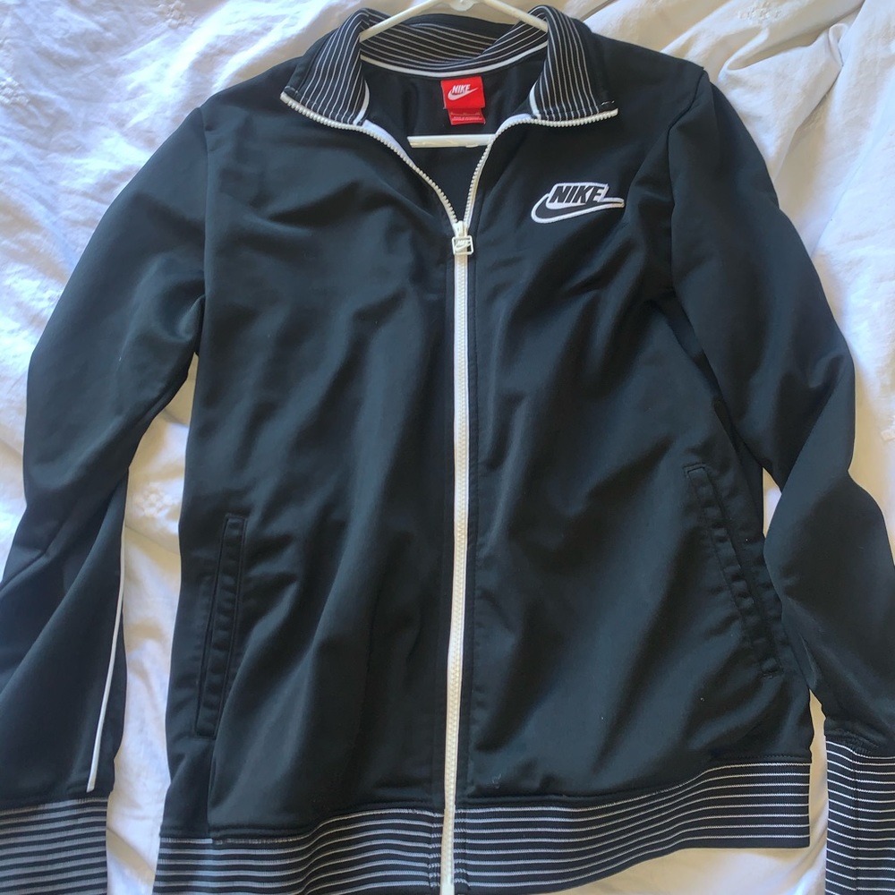 Nike zip up with black and white stripes